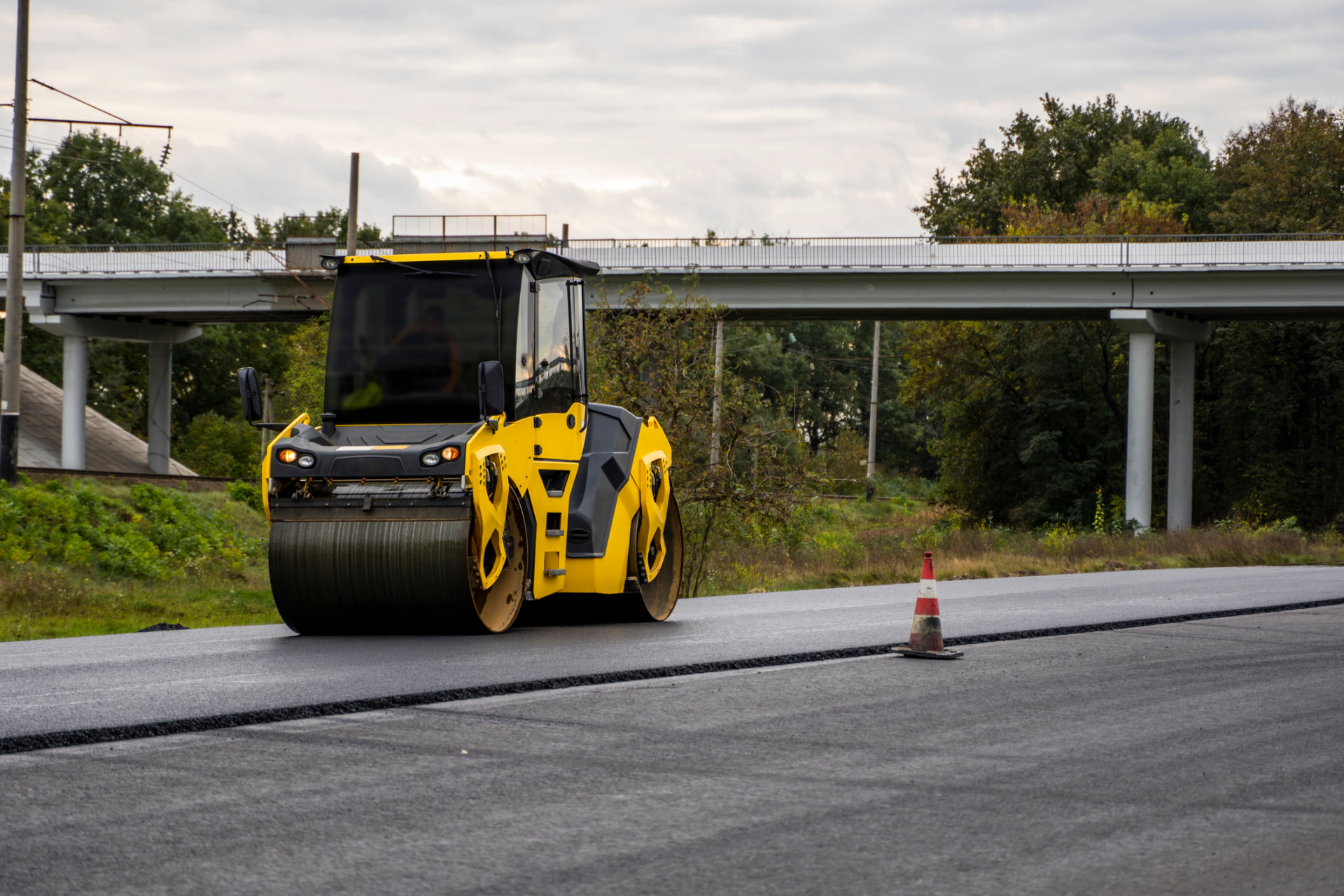 Tandem roller compacting a newly paved roadway in Freehold, New Jersey