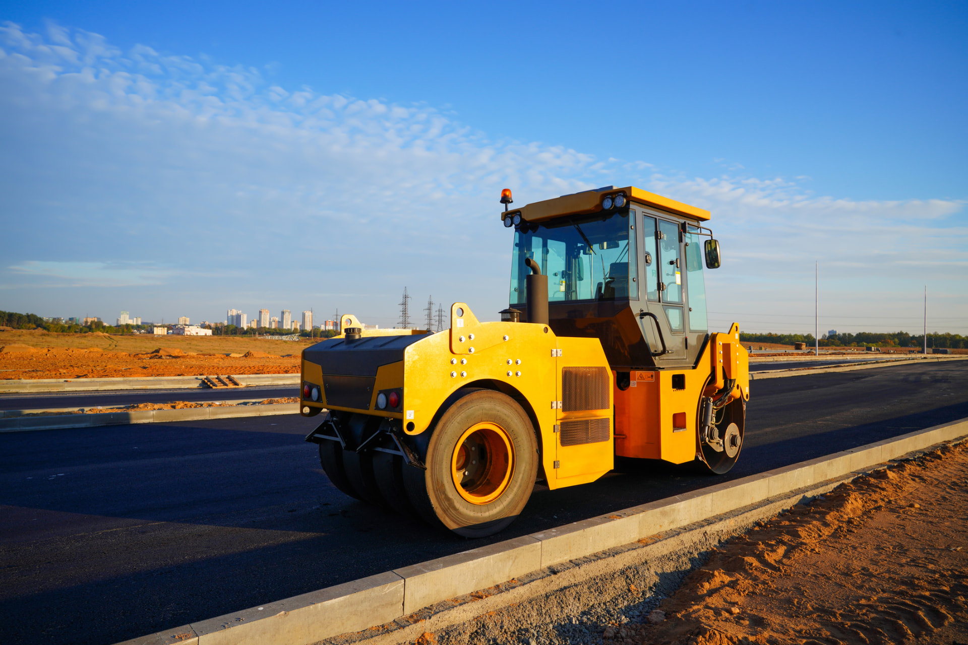 Asphalt roller finishing a new road surface in Shamong, New Jersey