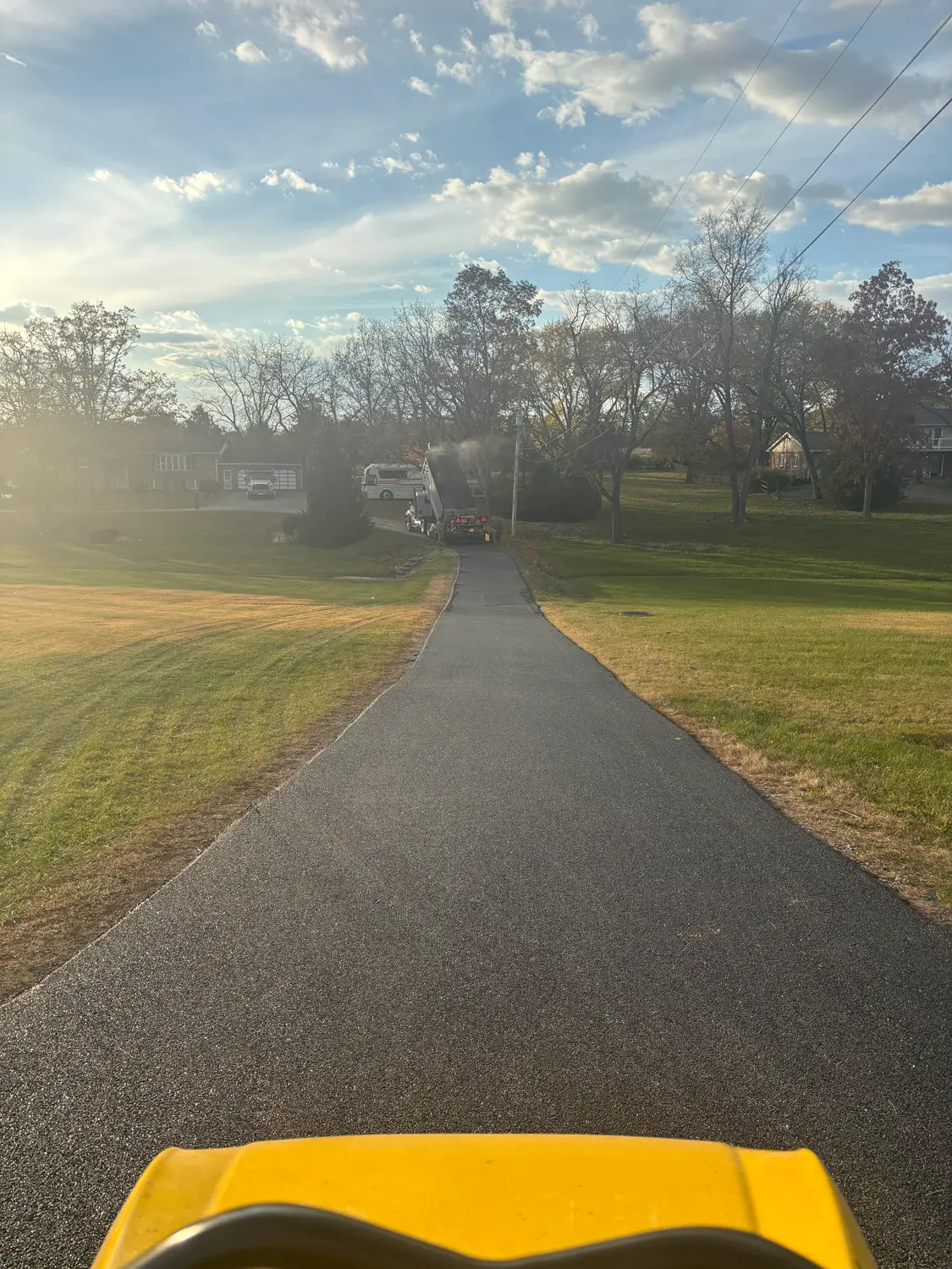 Residential driveway paving in progress by GSP Asphalt Paving