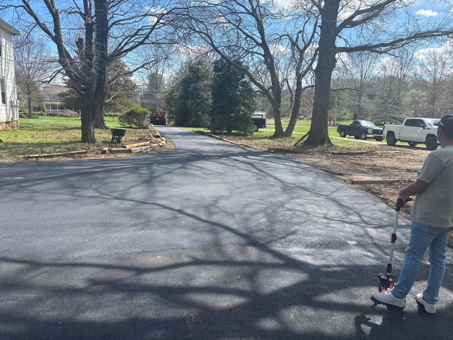 Completed residential driveway paving project by GSP Asphalt Paving