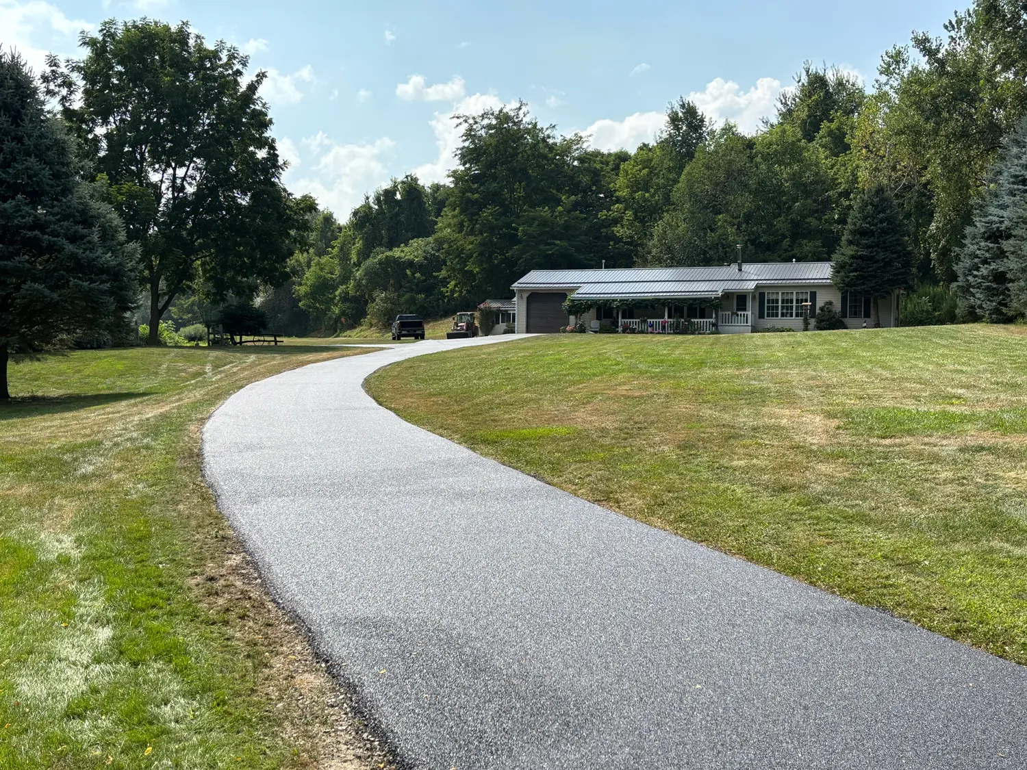 Long residential asphalt driveway paving by GSP Asphalt Paving